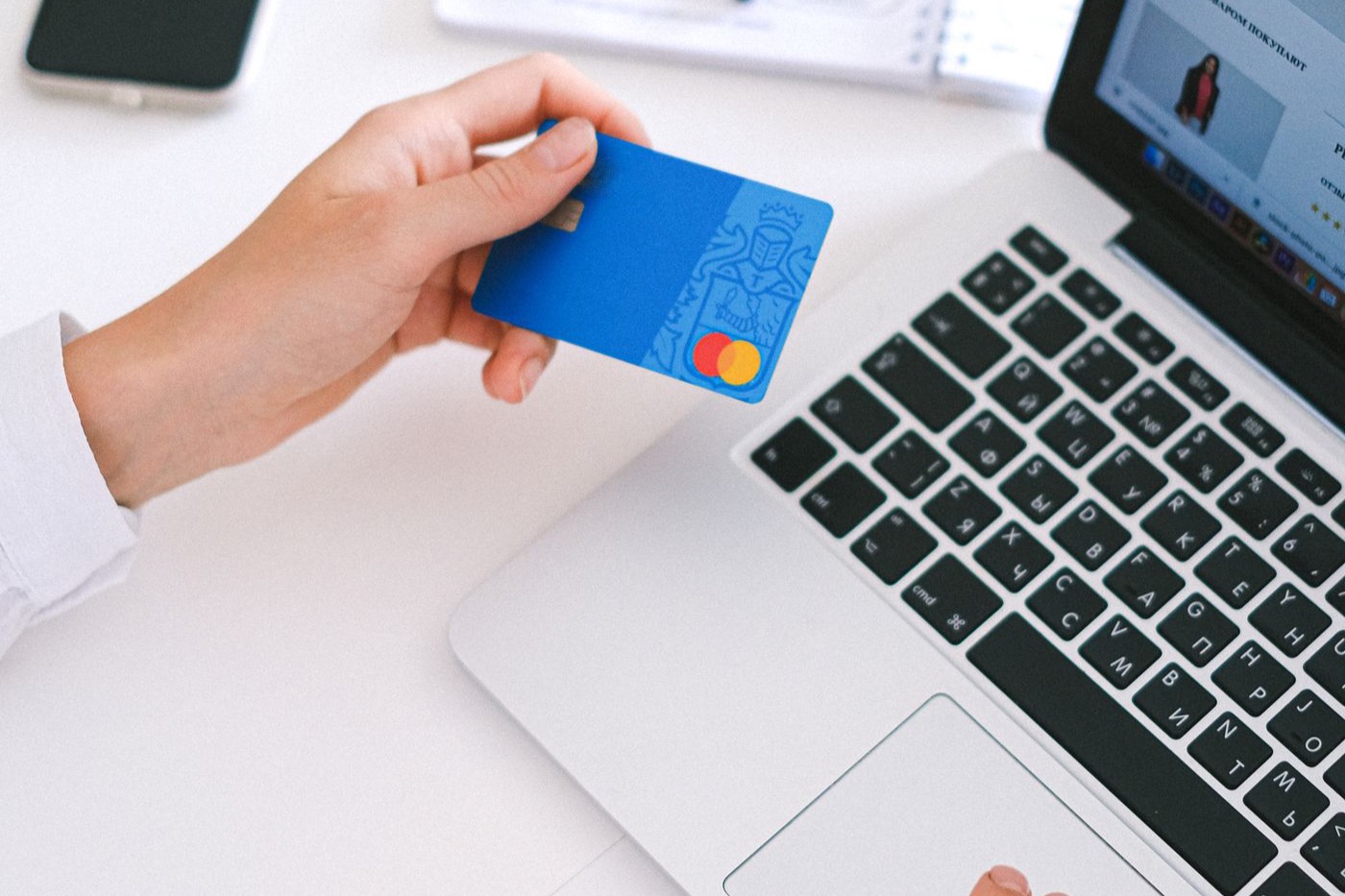 Online booking and checkout on a laptop.