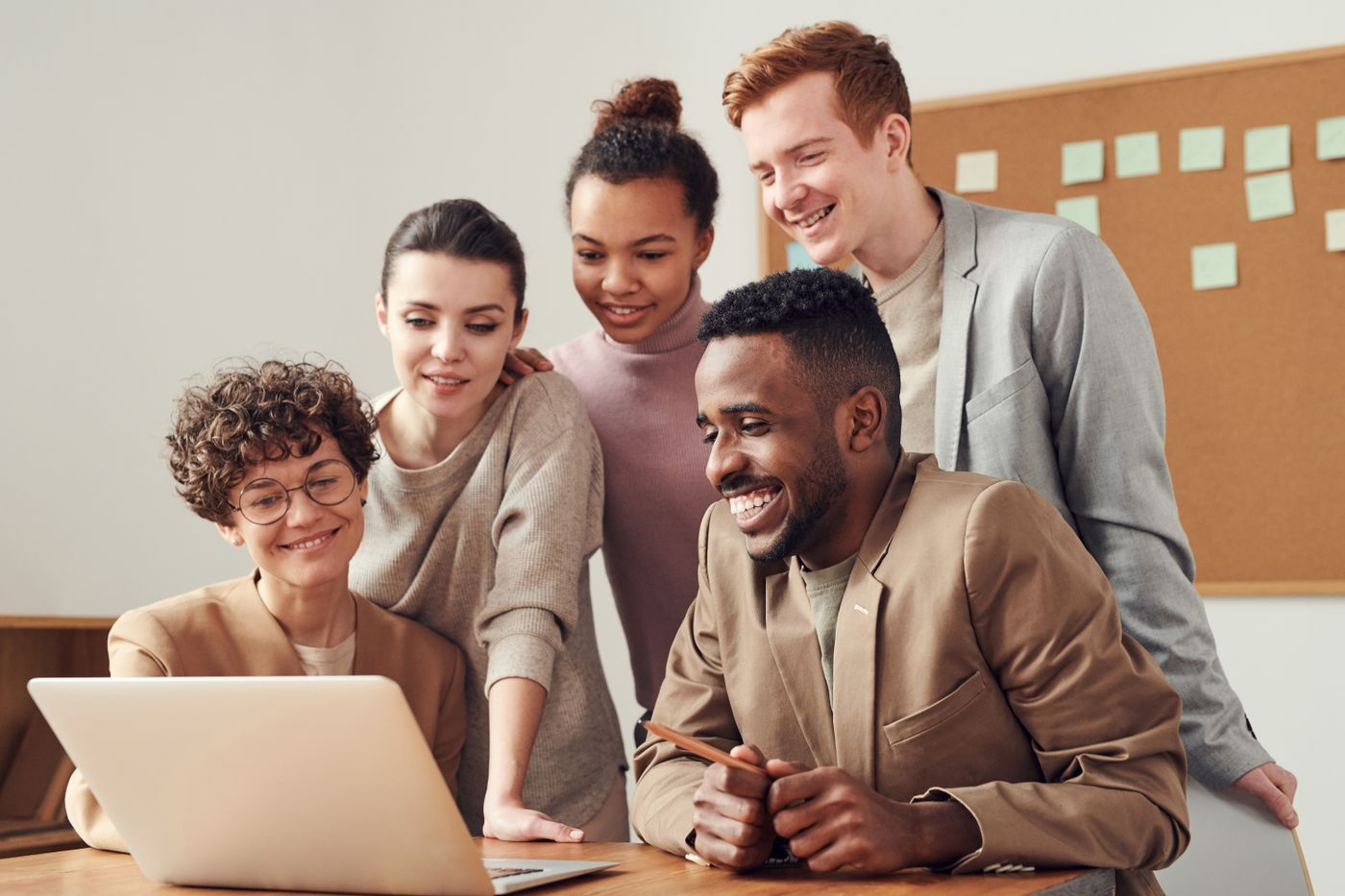 A product and marketing team reviewing growth work together.